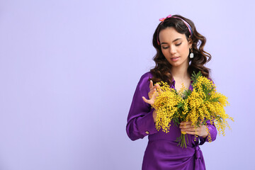 Wall Mural - Beautiful young woman with bouquet of mimosa flowers on lilac background