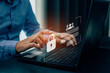 © kelvn - Businessmen protecting personal data on laptop and virtual interfaces, user typing login and password, cyber security concept.