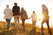 © Mariusz S/peopleimages.com - Lost in the tranquility. Shot of a happy family holding hands on a morning walk together.