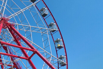 Wall Mural - big ferris wheel against a clear blue sky