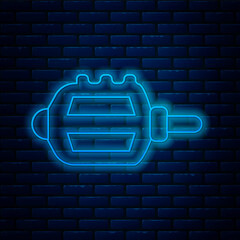 Poster - Glowing neon line Bicycle pedal icon isolated on brick wall background. Vector