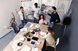 © New Africa - Team of employees celebrating success in office. Startup project