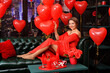 © aletia2011 - Beautiful woman with heart shaped balloons on Valentine's day