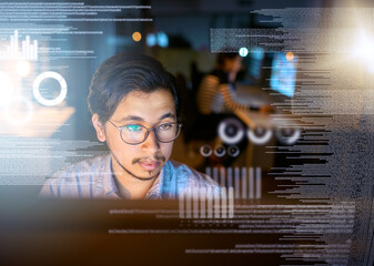 Leinwandbilder - Working on getting these codes cracked. Shot of a computer programmer looking through data in the office.