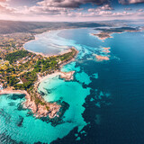 Fototapeta Na sufit - Aerial view of the paradise seashore with various shades of turquoise water. Coral reefs and secluded sandy beaches in the resort village of Vourvourou in Sithonia, Halkidiki.