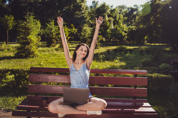 Poster - Photo of cute brown hair girl raise hands sitting bench enjoy fresh air outdoors spend free time in park