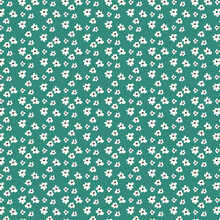 Seamless Floral Pattern With Little White Flowers On Green Background