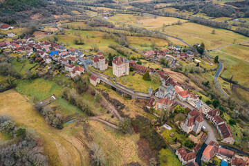 Wall Mural - Aerial view of Curemonte in France, with old castles and the historic town buildings in the village