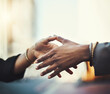 © Delmaine Donson/peopleimages.com - You meet tons new people out in the city. Closeup shot of two businesswomen shaking hands in the city.