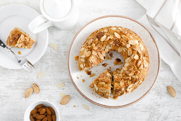 Wall Mural - French almond cake with nuts. Top view, overhead