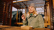© brillianata - Woman eating tasty french fries in outdoor cafe. Sunny winter day. Woman at an urban outside street food court.