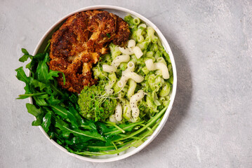 Canvas Print - Pesto pasta and cauliflower steak. .style rustic