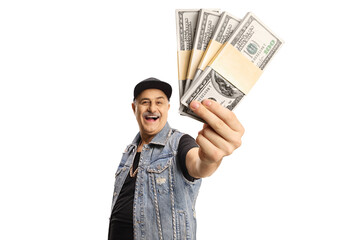 Wall Mural - Happy mature man in a denim vest holding money