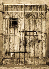 Sticker - old wooden door at a historic building