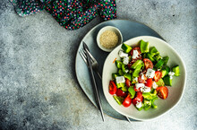Overhead View Of A Bowl Of Fresh Greek Salad With Sesame Seeds
