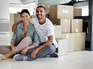 Aufkleber - All the boxes are in, time to start unpacking. Portrait of a happy young couple sitting on their living room floor on moving day.