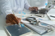 © onephoto - Insurance Healthcare  Doctor analyzing medical  report and medical  on hospital background