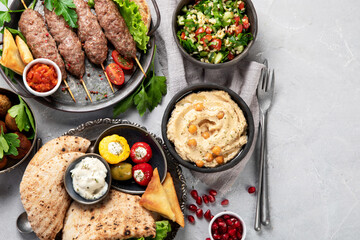 Wall Mural - Lebanese food assortment on light background.