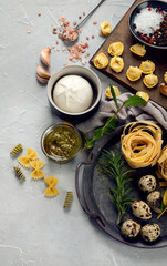 Sticker - Italian pasta assortment on light background.