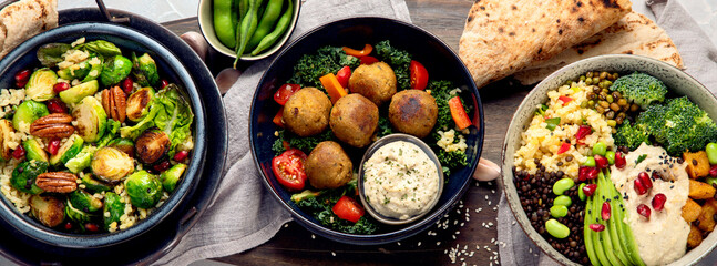 Canvas Print - Vegan dishes assortment on light background.