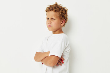 boy with white hair angry facial expression resentment light background