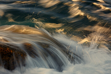 Wall Mural - A beautiful landscape of a running river on a sunny day