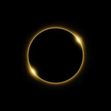 Solar Eclipse In Golden Light In Black Background.