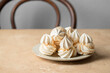 © vasanty - Traditional  Canary islands sweet  Suspiro de Moya, big Meringue made with whipped eggs  on the table.