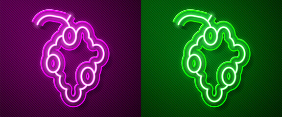 Sticker - Glowing neon line Grape fruit icon isolated on purple and green background. Vector