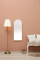 Wall Mural - Room interior with white bench and mirror hanging on light pink wall. Stylish accessories