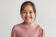 © Prostock-studio - Headshot Of Toothy Chinese Kid Girl Posing Smiling, Gray Background