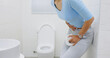 woman feel pain with constipation