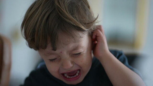 Upset child crying one small boy cries