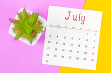 July 2022 Calendar On Multicolored Background.
