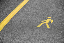 Yellow Pedestrian Sign On Sidewalk, Road Yellow Marking For Traffic Safety Near Highway