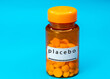 Medical vial with placebo pills. Medical pills in orange Plastic Prescription