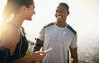 © Delmaine Donson/peopleimages.com - Having a workout buddy makes all the difference. Shot of a fit young couple working out together outdoors.
