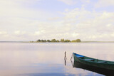 Fototapeta Pomosty - Landscape with a boat in a rural area on Lake Seliger with silence