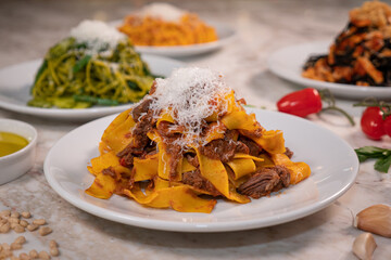 Canvas Print - A closeup shot of fresh duck with ragu and parmesan cheese