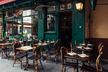 Wall Mural - typical view of the parisian street with tables with tables of cafe in paris, france. architecture a