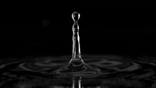 Super Slow Motion Of Dripping Water Drop Filmed With Macro Lens. Filmed On High Speed Cinema Camera, 1000fps.