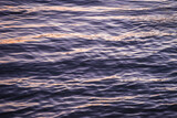Fototapeta Łazienka - Water texture. Water reflection texture background. Abstract water surface, dark water or oil surface. Ocean surface dark nature background. River lake rippling Water.