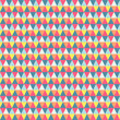 Seamless vector pattern. Abstract geometric background of triangles in in red, blue, orange, yellow tone. For use on wallpaper, fabric, packaging and more.