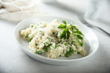 Canvas Print - Traditional Italian risotto with green pea