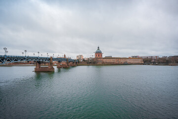 Wall Mural - Garonne river and Dome of the 'Hopital de la Grave' at dusk in Toulouse, France