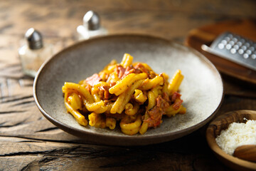 Wall Mural - Pasta with pastrami and cheese