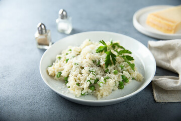 Wall Mural - Traditional Italian risotto with green pea