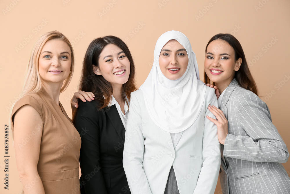 Beautiful women on color  background. Unity concept