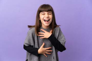 Wall Mural - Little girl over isolated background smiling a lot