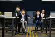 © Nomad_Soul - Business children having fun riding office chair